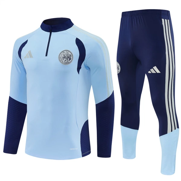Ajax Trening sweatshirt i hlače komplet Četvrtina Zip 2026/27 Plava Ajax Trening sweatshirt i hlače komplet Četvrtina Zip 2026/27 Plava