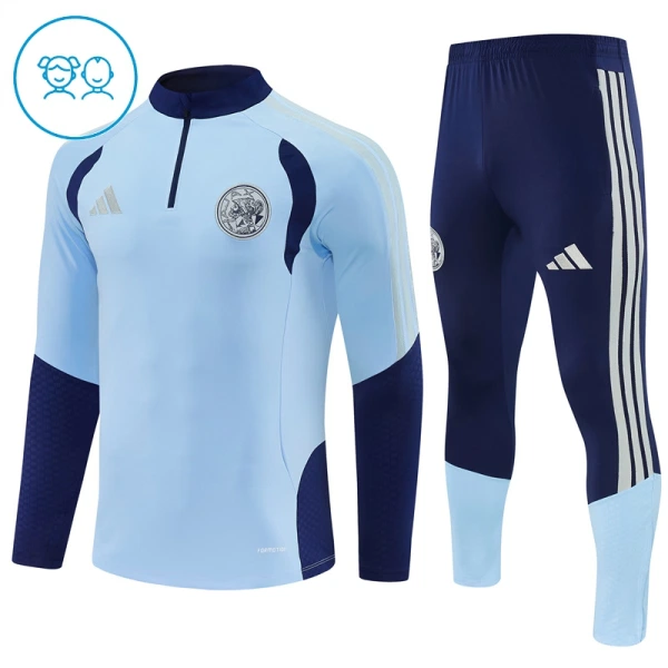 Dječji Ajax Trening sweatshirt i hlače komplet Četvrtina Zip 2026/27 Plava Dječji Ajax Trening sweatshirt i hlače komplet Četvrtina Zip 2026/27 Plava